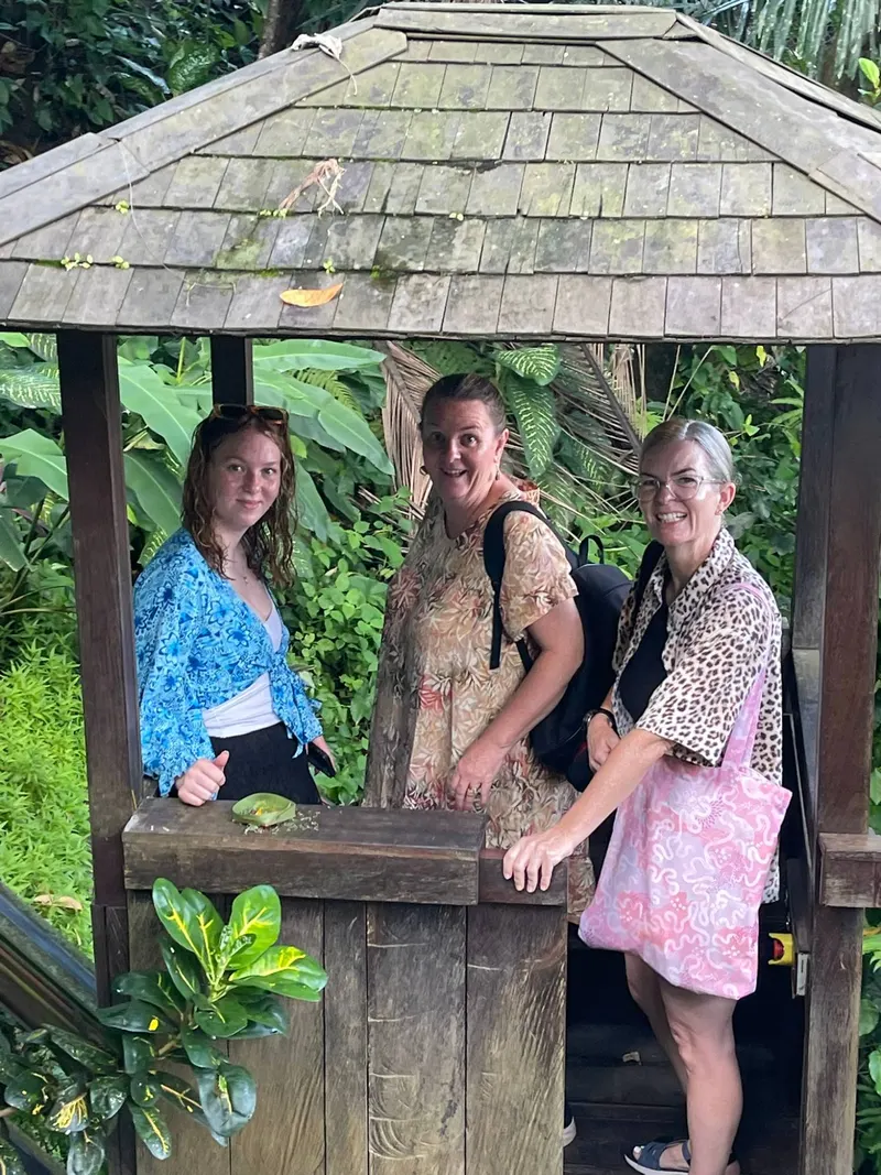 Three guests in the River Song hillside elevator cabin