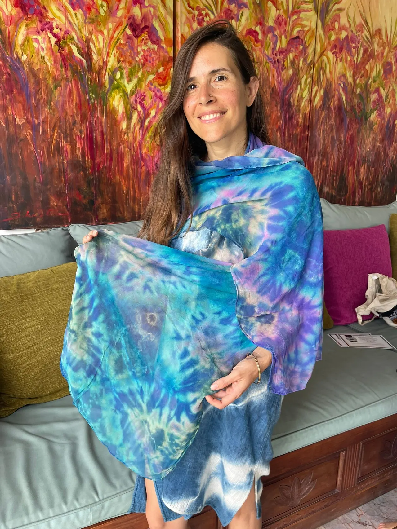 Guest wrapped in a blue and turquoise tie-dye sarong