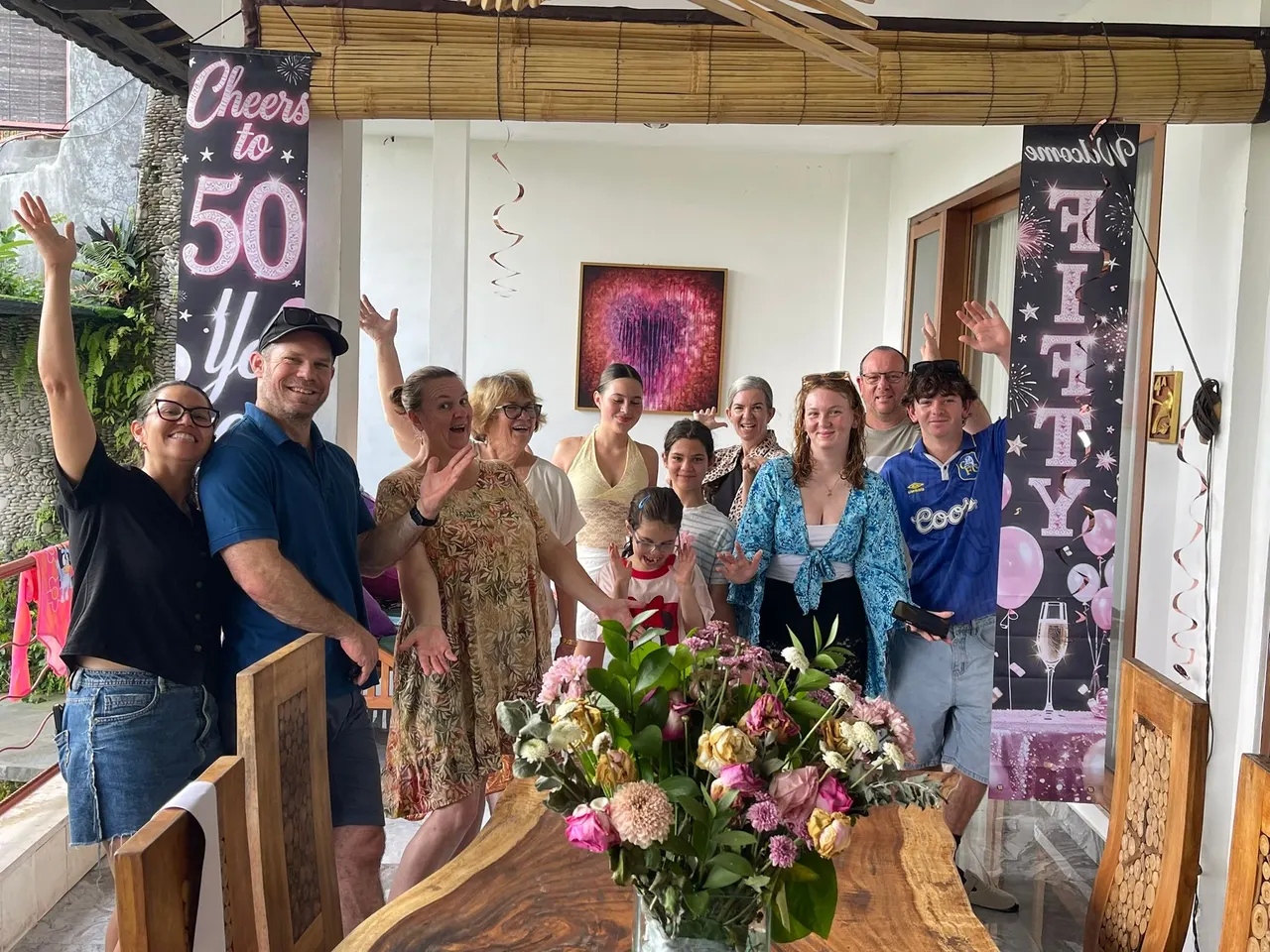Family and friends celebrating a fiftieth birthday