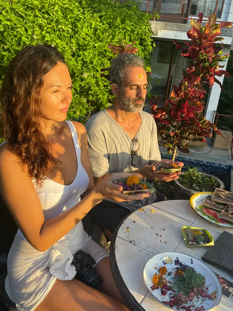 Guests preparing Balinese offerings in the Garden of Gratitude