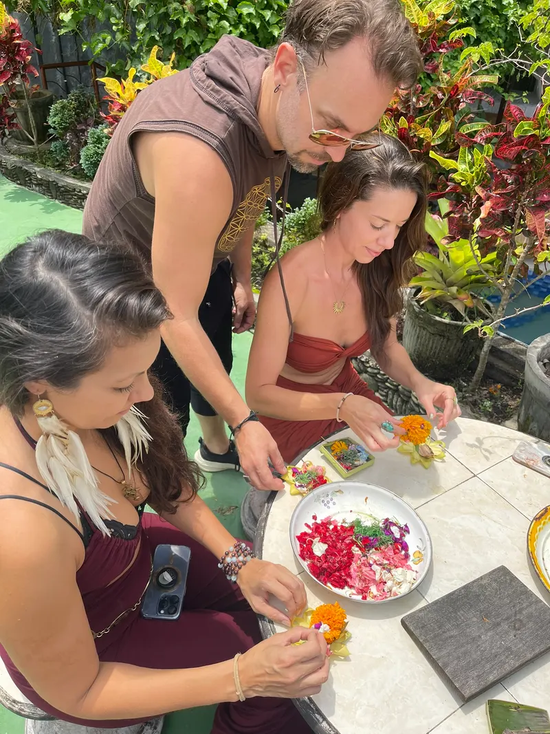 Guests making offerings at the garden table