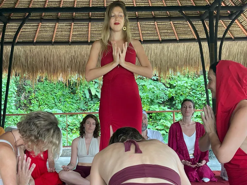 Guided circle session under the thatched shala roof